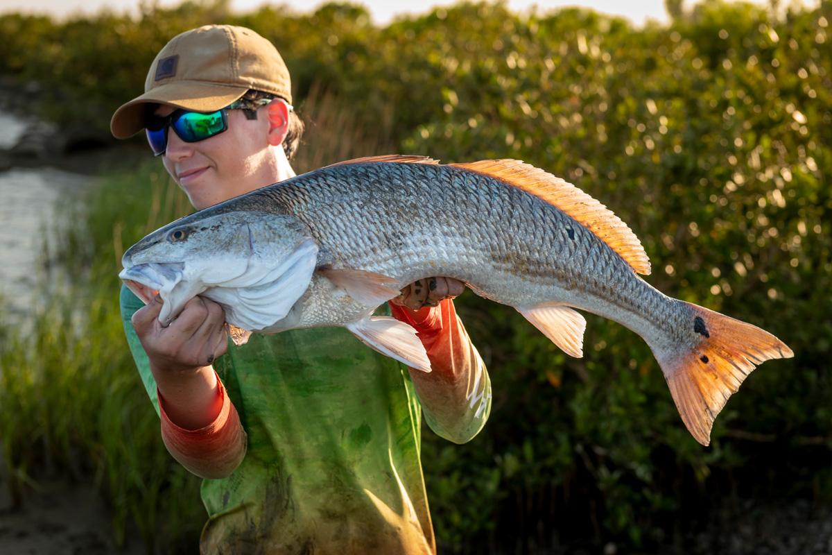 kid with big fish